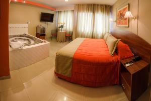 A bed or beds in a room at HOTEL Javier Prado Inn
