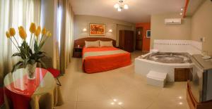 A bed or beds in a room at HOTEL Javier Prado Inn