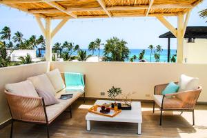Posezení v ubytování Luxurious pent house steps from the beach, B4, Los Corales, Playa Bavaro
