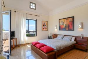 En eller flere senge i et værelse på Villa Marta + 20 billeder