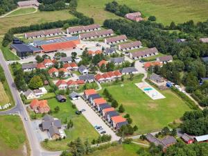 an aerial view of a small village with houses at 6 person holiday home on a holiday park in Bl vand in Blåvand