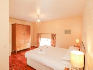 Katil atau katil-katil dalam bilik di Shetland Cottage