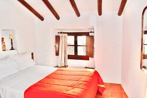 Tempat tidur dalam kamar di Casa D’ Santiago