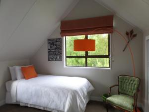 Una cama o camas en una habitación de Riverstone House