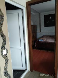 A bed or beds in a room at Qusha Guesthouse Meeting in the mountains and views