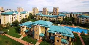 an overhead view of a building with blue roofs at Casa Bella in Ştefăneştii de Jos