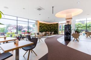 Reštaurácia alebo iné gastronomické zariadenie v ubytovaní Pierre Hotel