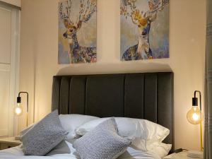 Voodi või voodid majutusasutuse Sawley in the Forest of Bowland - cosy cottage. toas