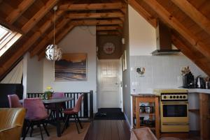 Kuchyň nebo kuchyňský kout v ubytování B&B De Pastorie bij Dokkum