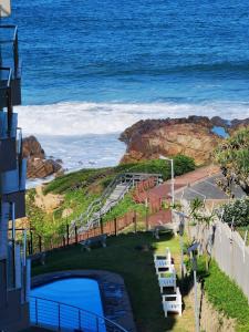 a view of the ocean from a building at Whale Rock 29, The ultimate beach living experience. in Margate