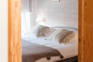 Postel nebo postele na pokoji v ubytování Maison Mariette