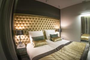 Кровать или кровати в номере NovaWisła Resort & SPA