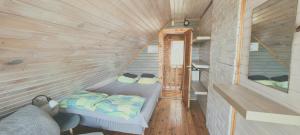 Postel nebo postele na pokoji v ubytování Partsilombi Holiday Home
