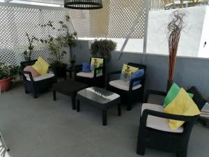 A seating area at Pensión Playa