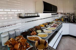 a buffet line with many different types of food at Cappadocia Symbol Hotel in Uçhisar