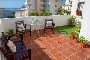 A balcony or terrace at Sea view apartment, shared pools, Estepona, 60 m²