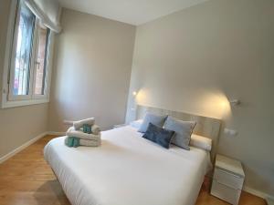Posteľ alebo postele v izbe v ubytovaní Apartamentos MIRADOR DEL TRANSITO