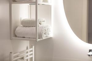 Posteľ alebo postele v izbe v ubytovaní Aborda Rooms