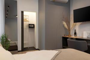 Posteľ alebo postele v izbe v ubytovaní Aborda Rooms