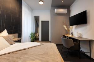 Posteľ alebo postele v izbe v ubytovaní Aborda Rooms