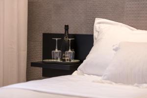 Posteľ alebo postele v izbe v ubytovaní Aborda Rooms