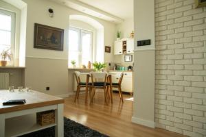 Telewizja i/lub zestaw kina domowego w obiekcie Apartament Mały Rynek