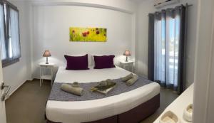 Postel nebo postele na pokoji v ubytování Levanda Guest Houses