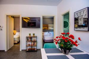 A television and/or entertainment centre at Avocado villa offering peace and relaxation
