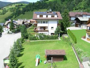 an aerial view of a house with a large yard at Residencesora in San Vigilio Di Marebbe