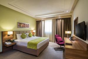 TV a/nebo společenská místnost v ubytování Mena Hotel Tabuk