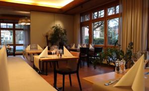 Reštaurácia alebo iné gastronomické zariadenie v ubytovaní Hotel Breiti
