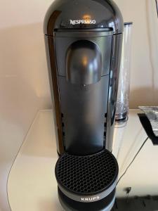 a coffee maker sitting on top of a table at Forest View - Castlewellan, County Down in Belfast