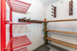 Palanda nebo palandy na pokoji v ubytování Ferienhaus Alpenrose