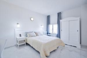 Posteľ alebo postele v izbe v ubytovaní New Central Apartment