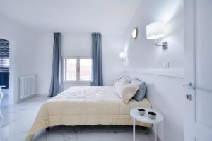 Posteľ alebo postele v izbe v ubytovaní New Central Apartment