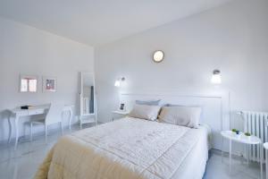 Posteľ alebo postele v izbe v ubytovaní New Central Apartment