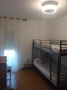 Un pat suprapus sau paturi suprapuse la Apartamento buena vista