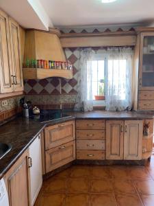 Kuchyň nebo kuchyňský kout v ubytování Casa La Tapita + 73 fotografií