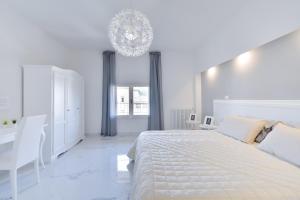Posteľ alebo postele v izbe v ubytovaní New Central Apartment