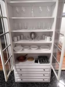 Kuchyň nebo kuchyňský kout v ubytování Arinza Apartman Vendégház