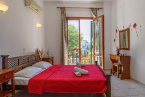 Posteľ alebo postele v izbe v ubytovaní Des Roses Hotel