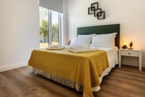 Posteľ alebo postele v izbe v ubytovaní QSF Agro Turismo Quinta da Sagrada Família