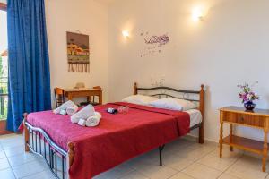 Posteľ alebo postele v izbe v ubytovaní Des Roses Hotel