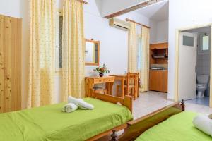 Posteľ alebo postele v izbe v ubytovaní Des Roses Hotel