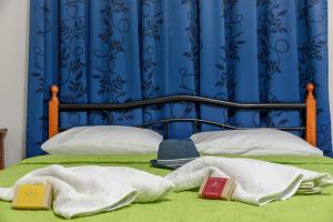 Posteľ alebo postele v izbe v ubytovaní Des Roses Hotel