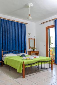 Posteľ alebo postele v izbe v ubytovaní Des Roses Hotel