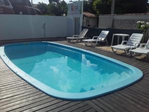 Bazén v ubytování Pousada Aldeia do Sossego nebo v jeho okolí