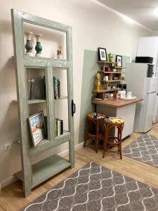 A kitchen or kitchenette at Diva Garden Apartment