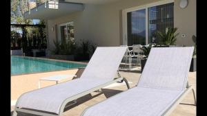 The swimming pool at or close to *CENTRAL LAKESIDE APT*Swimming Pool & Free Parking