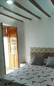 Postel nebo postele na pokoji v ubytování CASA LOS PATOS